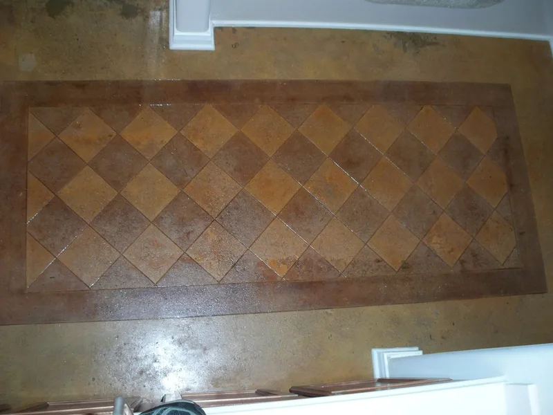 Rustic Stained Concrete with Scored rug design