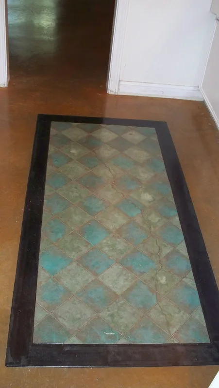 Scored Rug Design in Stained Concrete