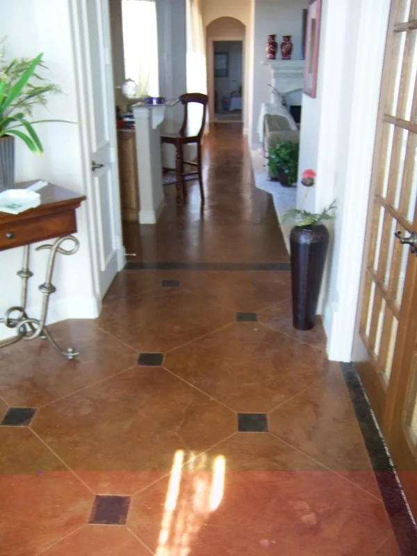 Custom Design stained concrete floor with scored pattern