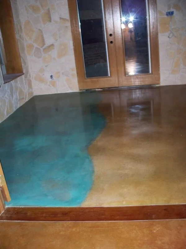 Custom Design of the ocean and beach in stained concrete floor on a custom home