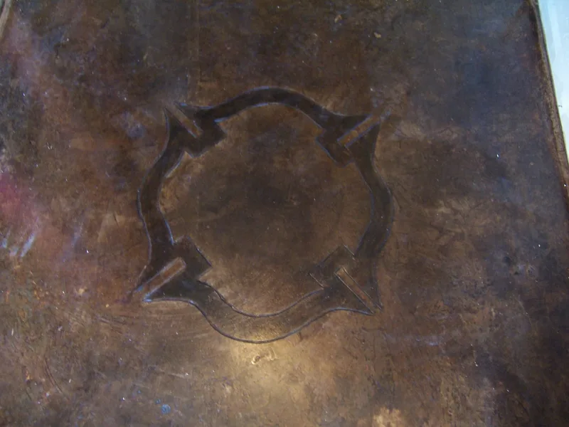 Shield scored and stained concrete